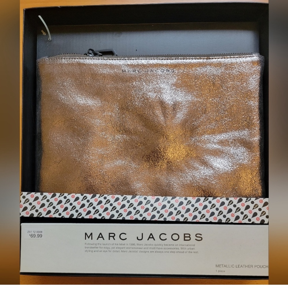 New Marc Jacobs Metallic Leather Pouch
Never used but no box